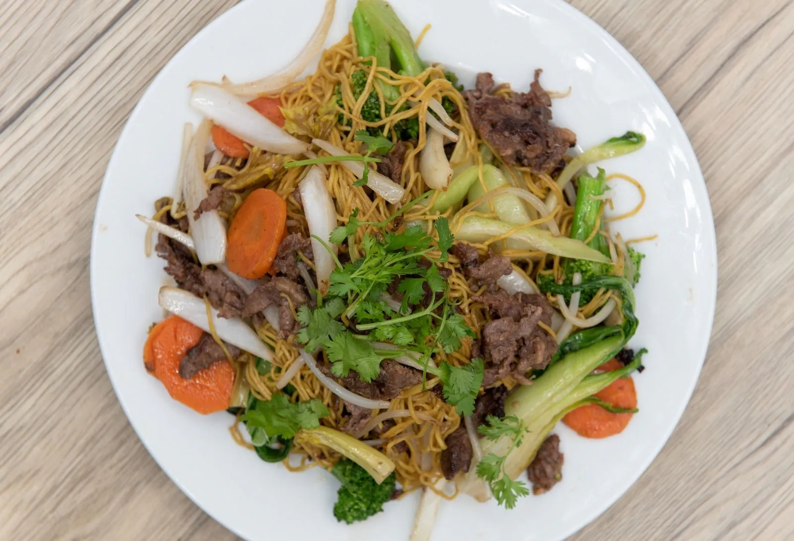 Beef stir-fried noodles with carrots and greens at Thanh Binh, a Vietnamese Restaurant in Lake Forest