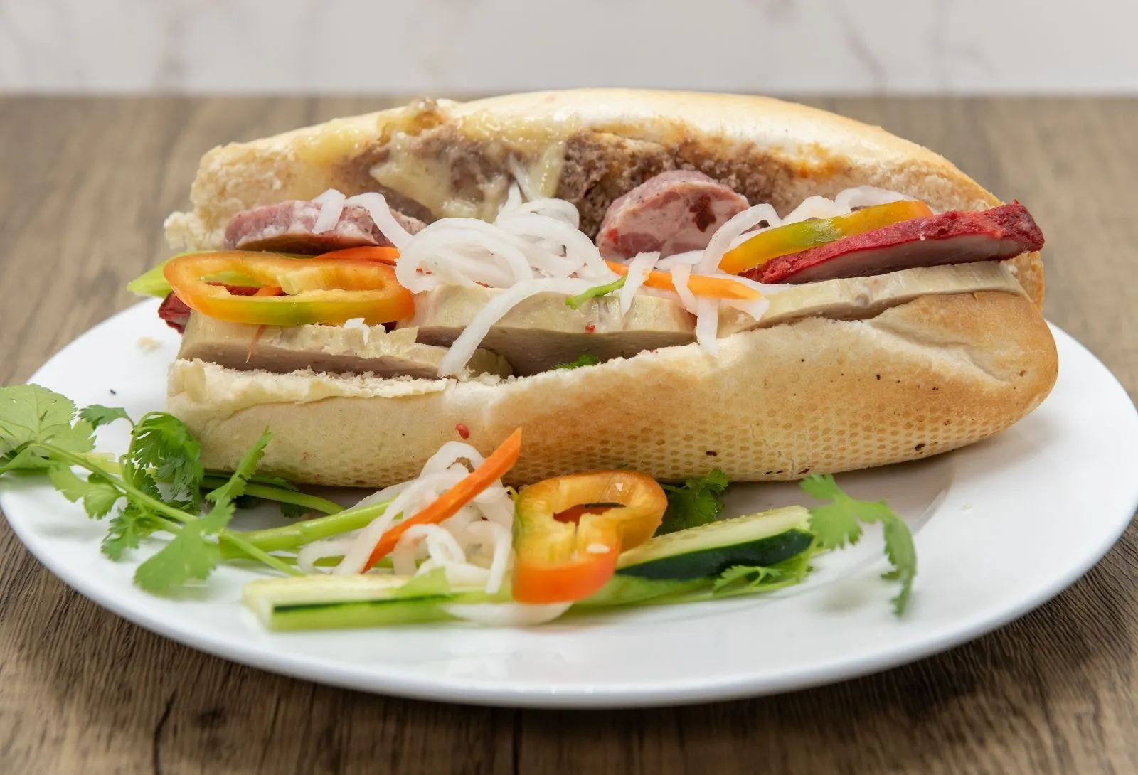 Hearty Vietnamese banh mi with pickled veggies at Thanh Binh, a Vietnamese Restaurant in Lake Forest